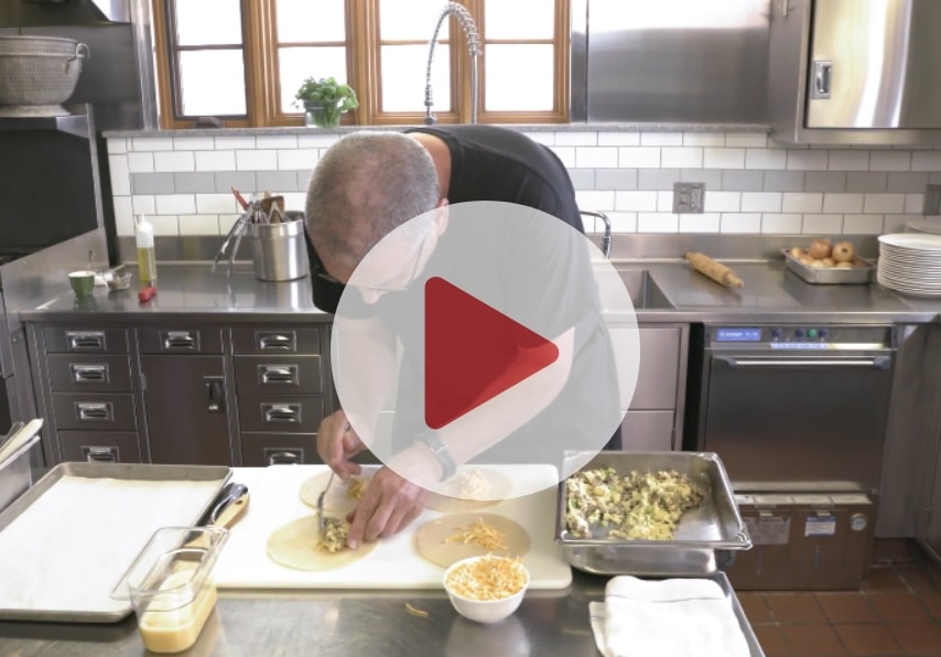 video still of sausage and egg turnovers prep